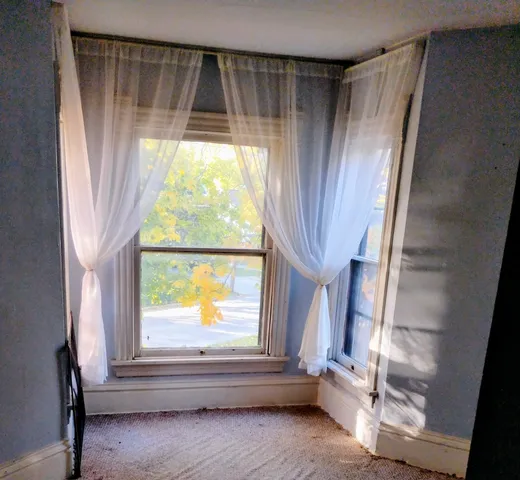 a bath tub sitting in a bathroom
