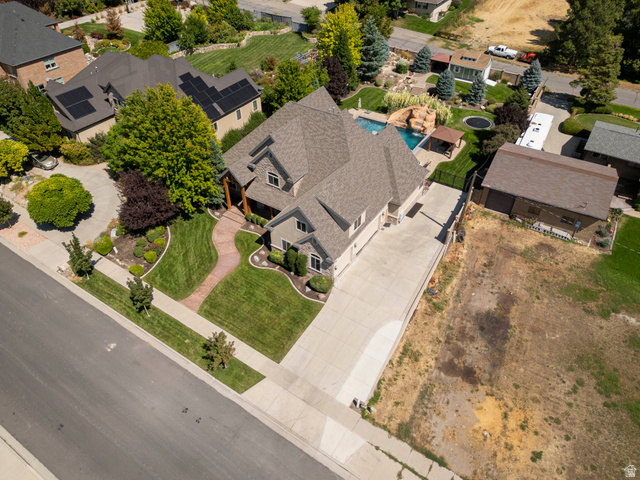 687 South 2080th Street East Springville, UT 84663 - Photo 69 of 149 Spacious residential property featuring a large home with a pool and extensive hardscaping