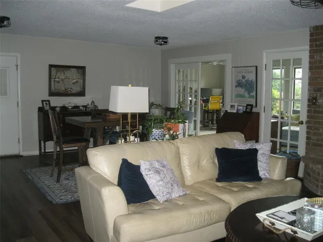 a front view of a house with outdoor seating
