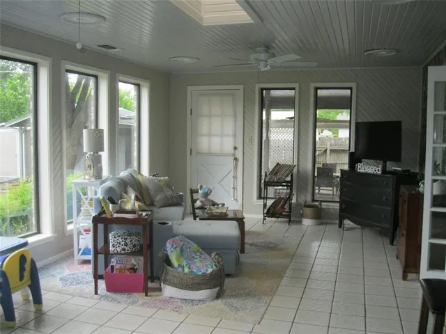 a workspace with furniture and window