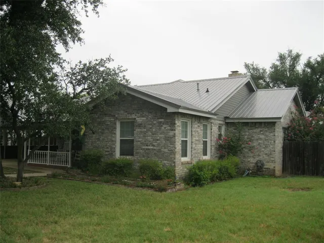 front view of house with a yard