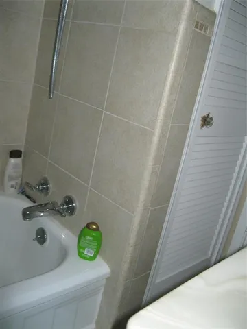 a bathroom with a sink and toilet