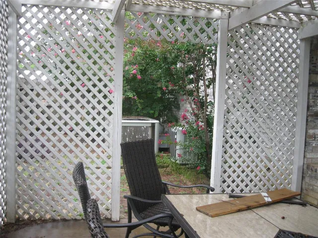 a house view with a backyard space