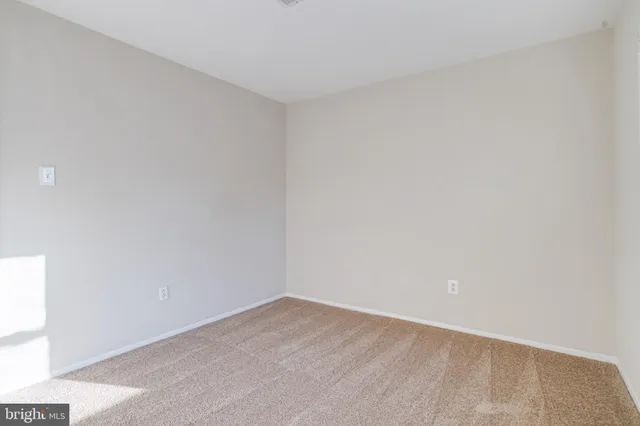 a view of livingroom with furniture and window