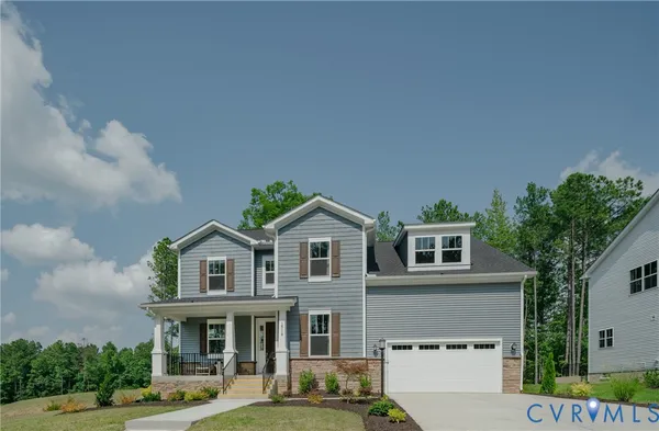 a front view of residential houses with yard