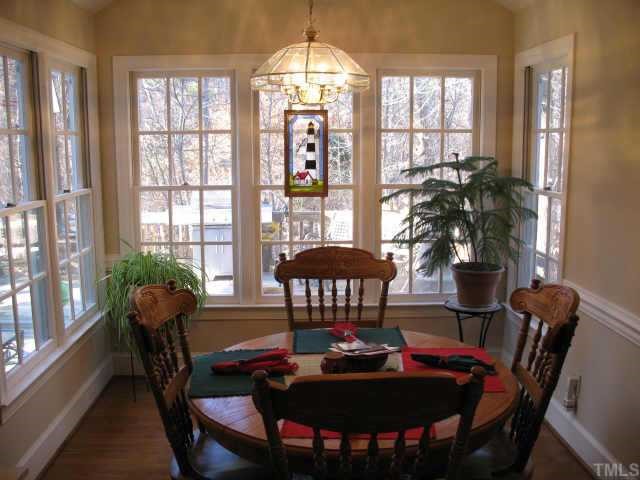 1405 Bascomb Drive Raleigh, NC 27614 - Photo 6 of 12 a view of a dining room with furniture window and outside view