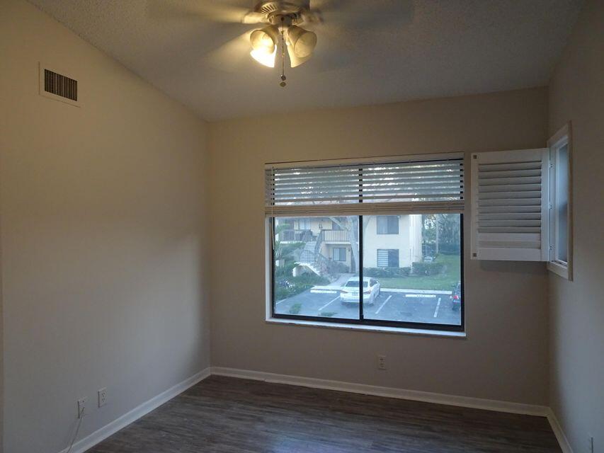 6551 Arleigh Court, Unit 201 Boca Raton, FL 33433 - Photo 9 of 12 208 2nd BEDROOM