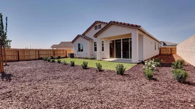 a house view with a garden space