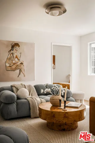 a living room with furniture and a couch