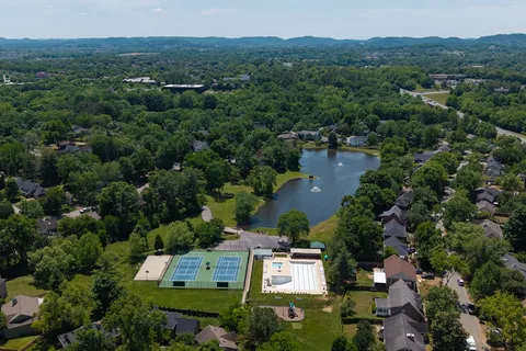 an aerial view of a house with a garden