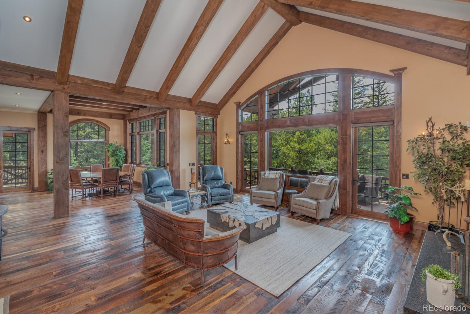 30 West Ranch Trail Morrison, CO 80465 - Photo 11 of 40 a living room with furniture and a large window