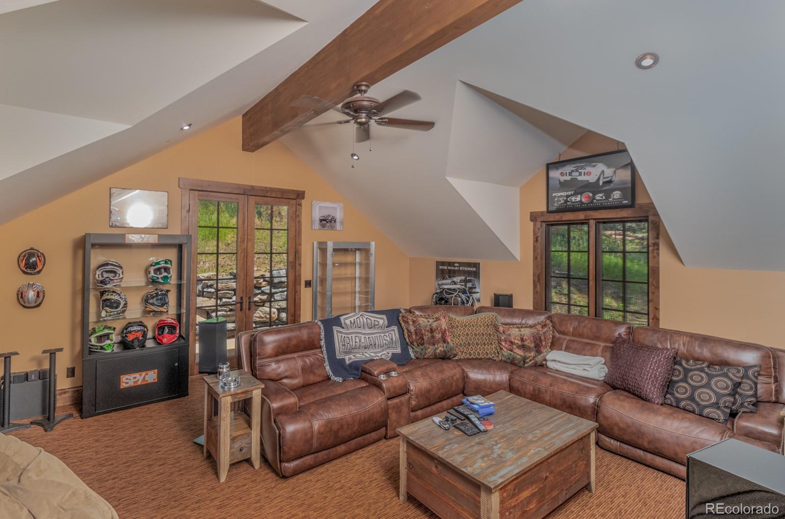 30 West Ranch Trail Morrison, CO 80465 - Photo 29 of 40 a living room with furniture and a large window