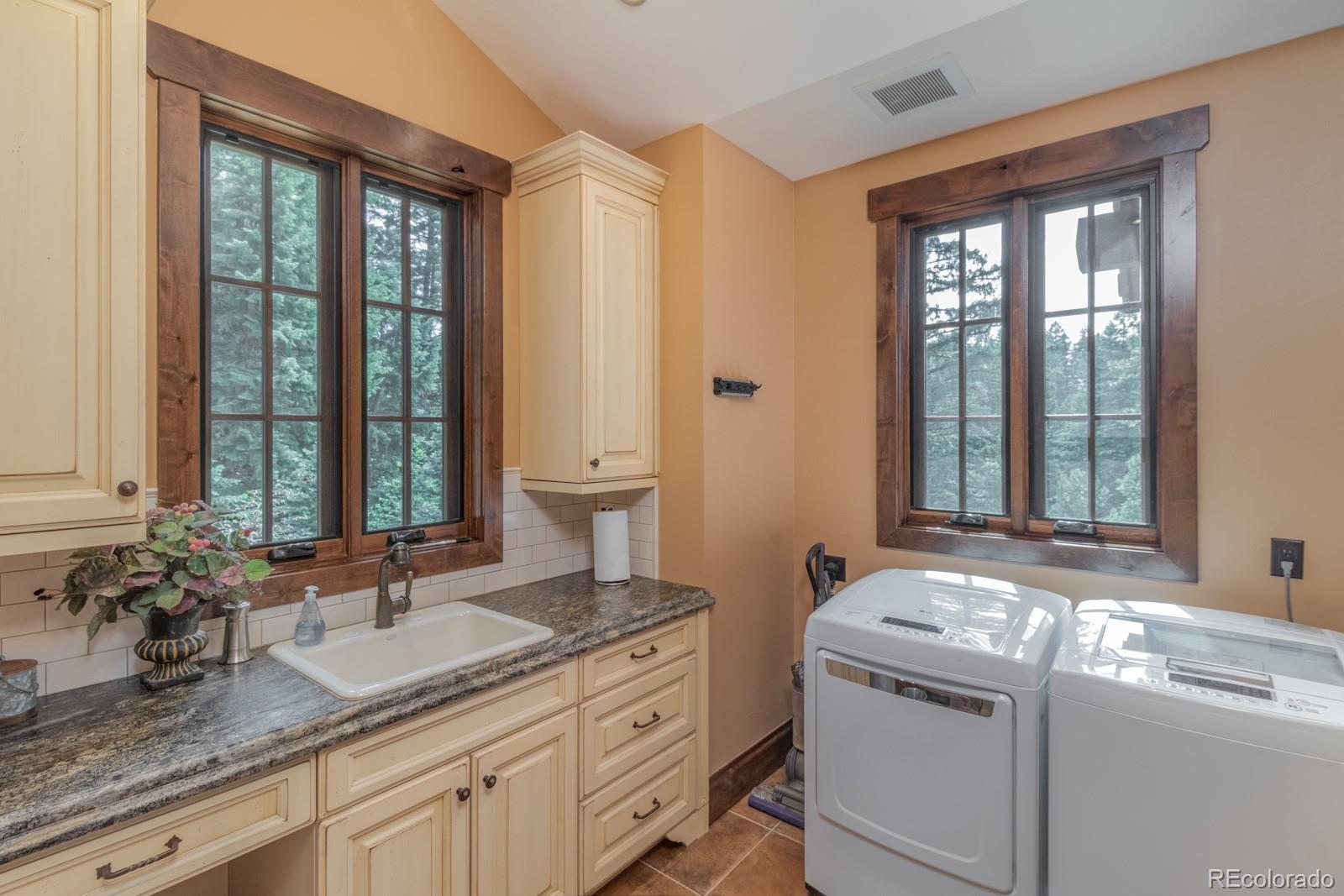 30 West Ranch Trail Morrison, CO 80465 - Photo 30 of 40 a view of bathroom with dual sinks