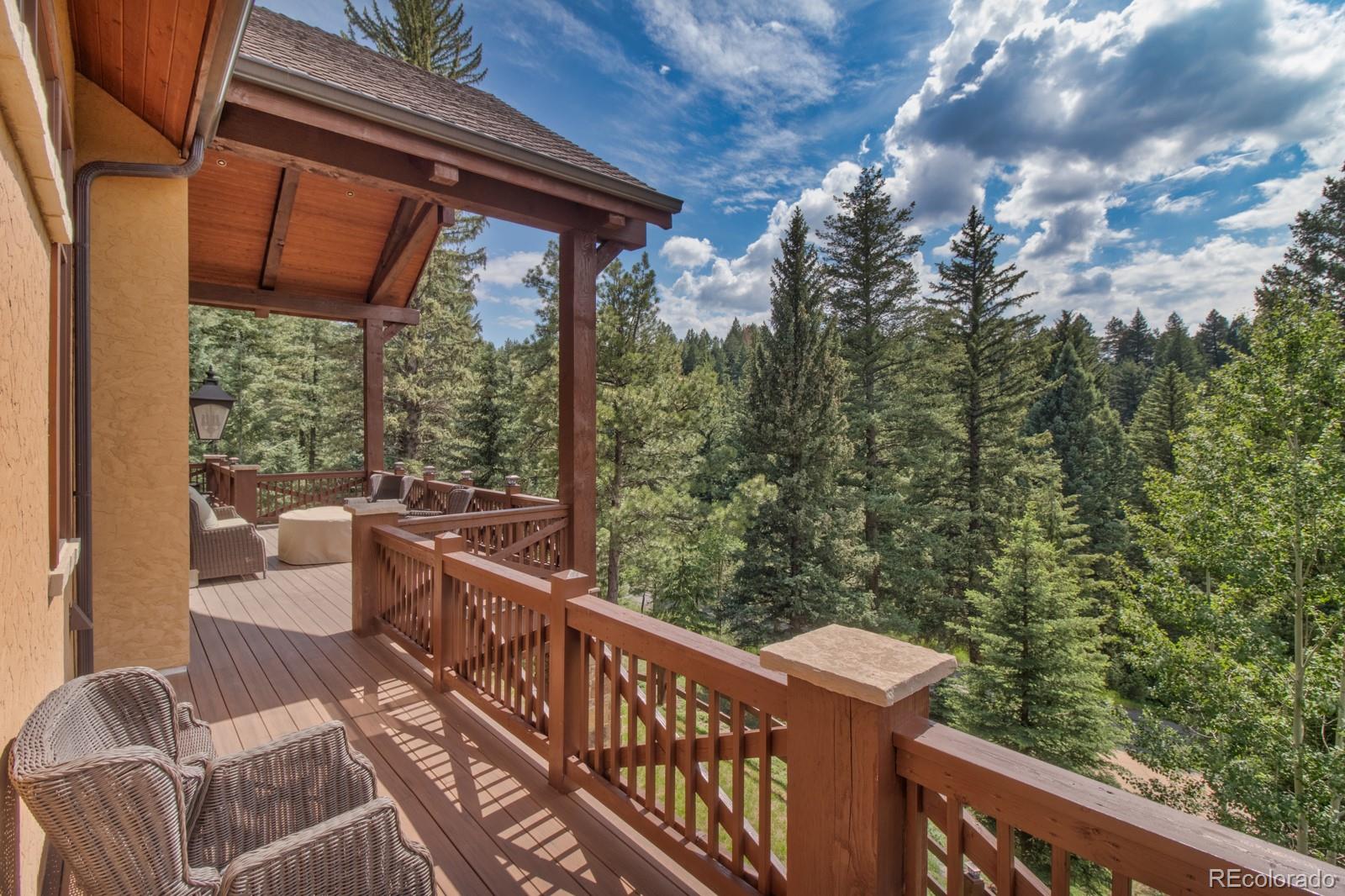 30 West Ranch Trail Morrison, CO 80465 - Photo 33 of 40 a view of a two chairs in the balcony