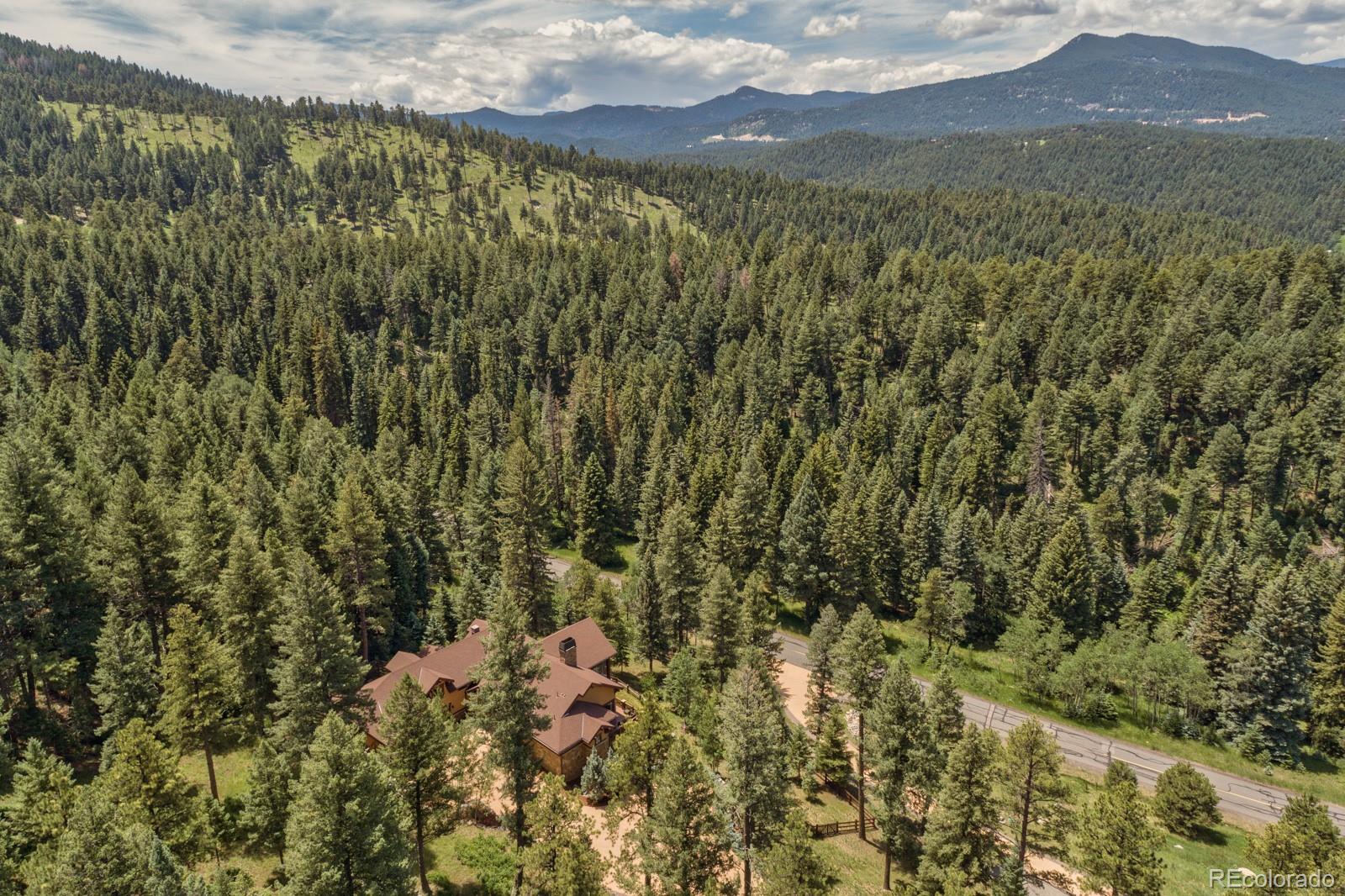 30 West Ranch Trail Morrison, CO 80465 - Photo 39 of 40 a view of mountain with green field