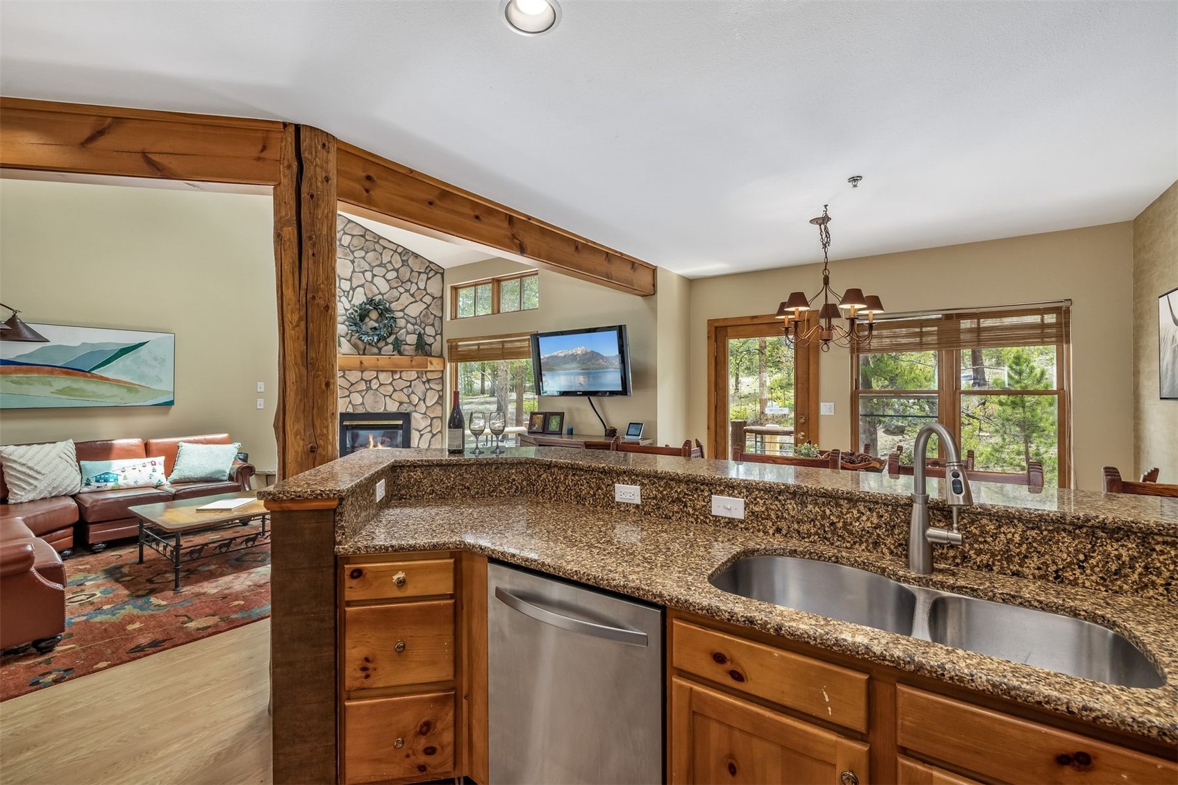 71 Starfire Lane, Unit 1978 Keystone, CO 80435 - Photo 7 of 40 a kitchen with granite countertop a sink and a window