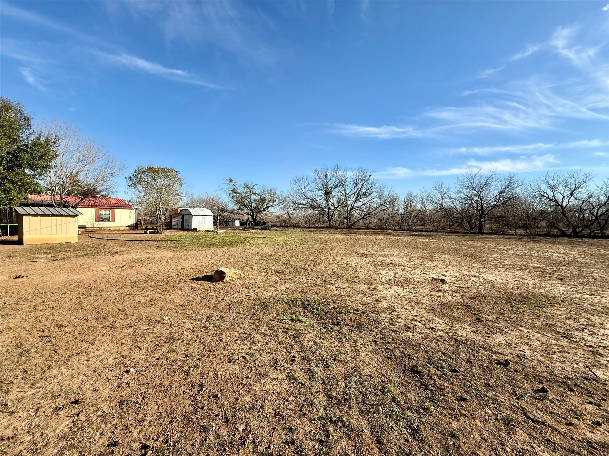 685 Fox Lane Lockhart, TX 78644 - Photo 4 of 39 View of yard featuring an outbuilding