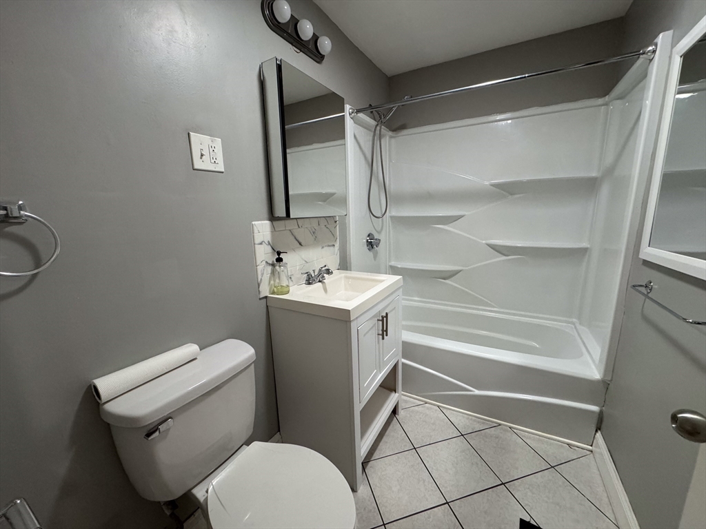 12 Dalrymple Street, Unit 2 Boston, MA 02130 - Photo 16 of 21 a bathroom with a toilet sink and shower