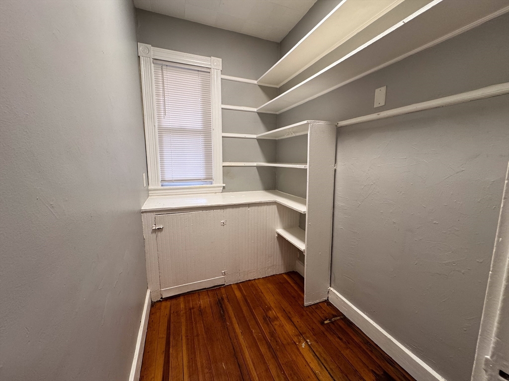 12 Dalrymple Street, Unit 2 Boston, MA 02130 - Photo 6 of 21 a view of an empty room with wooden floor and a window