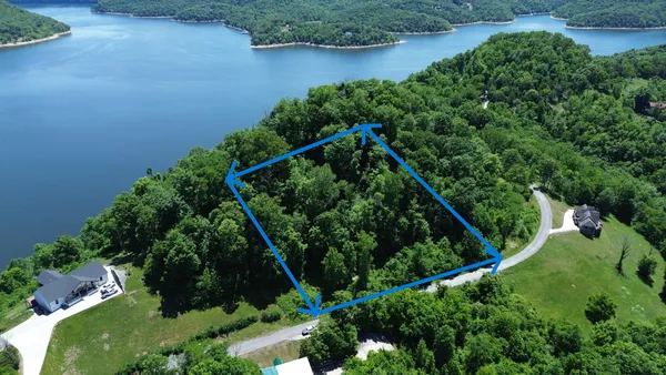 an aerial view of a house deck and outdoor space