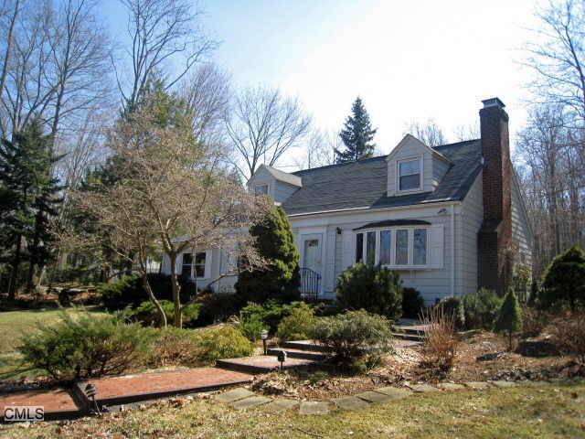 178 Bennetts Farm Road Ridgefield, CT 06877 - Photo 1 of 1 a front view of a house with garden