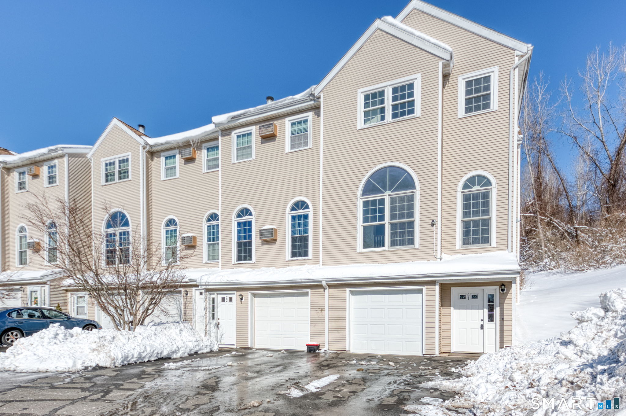 a front view of a house with a yard