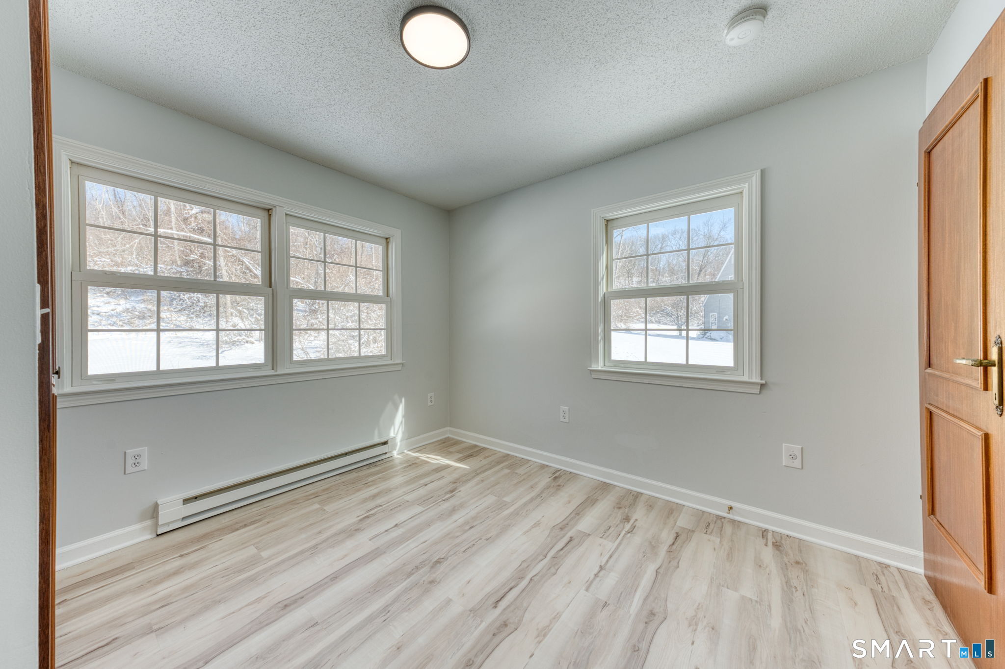 350 Bristol Street, Unit C1 Waterbury, CT 06708 - Photo 16 of 40 an empty room with windows