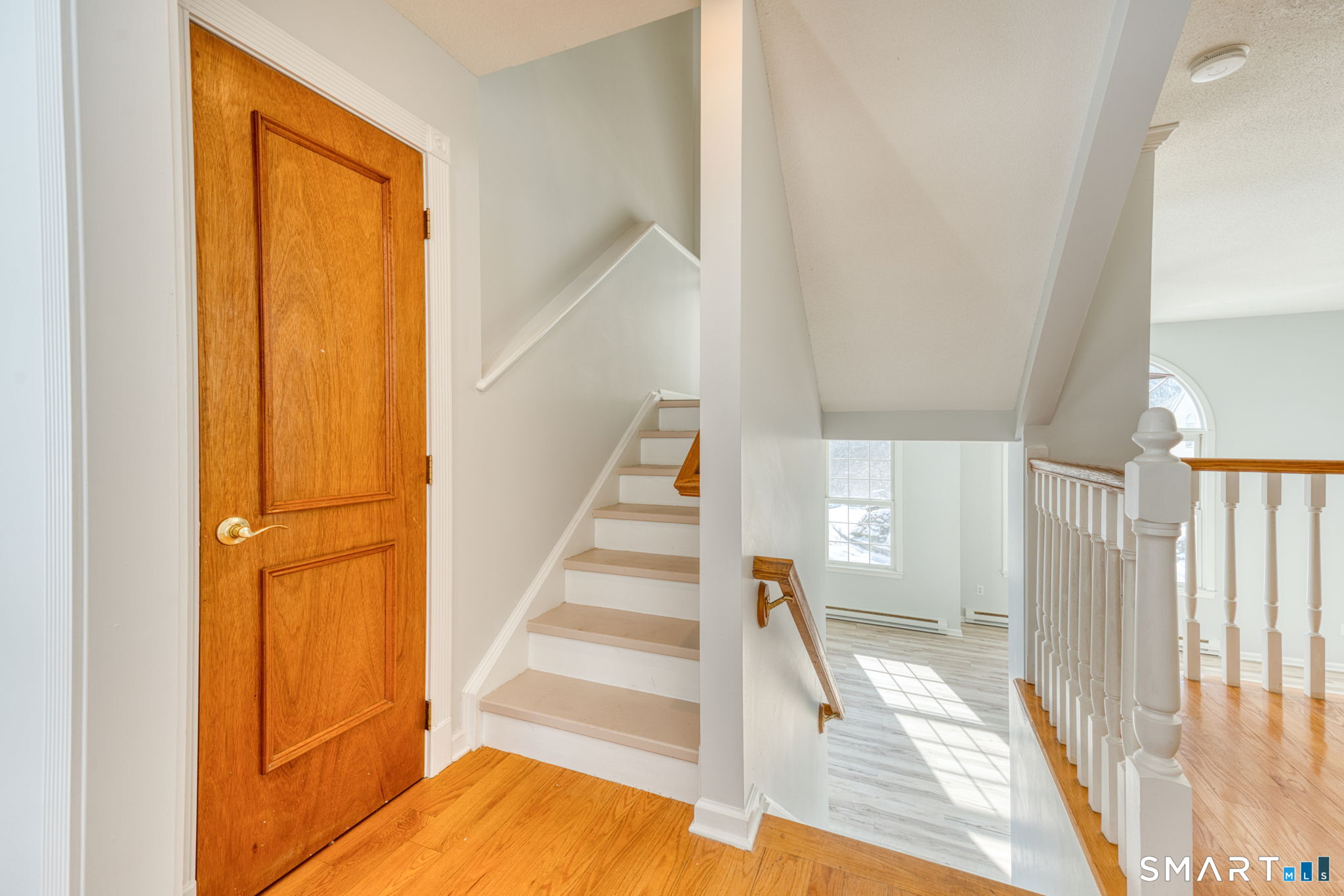 350 Bristol Street, Unit C1 Waterbury, CT 06708 - Photo 29 of 40 a view of staircase with white walls and a window