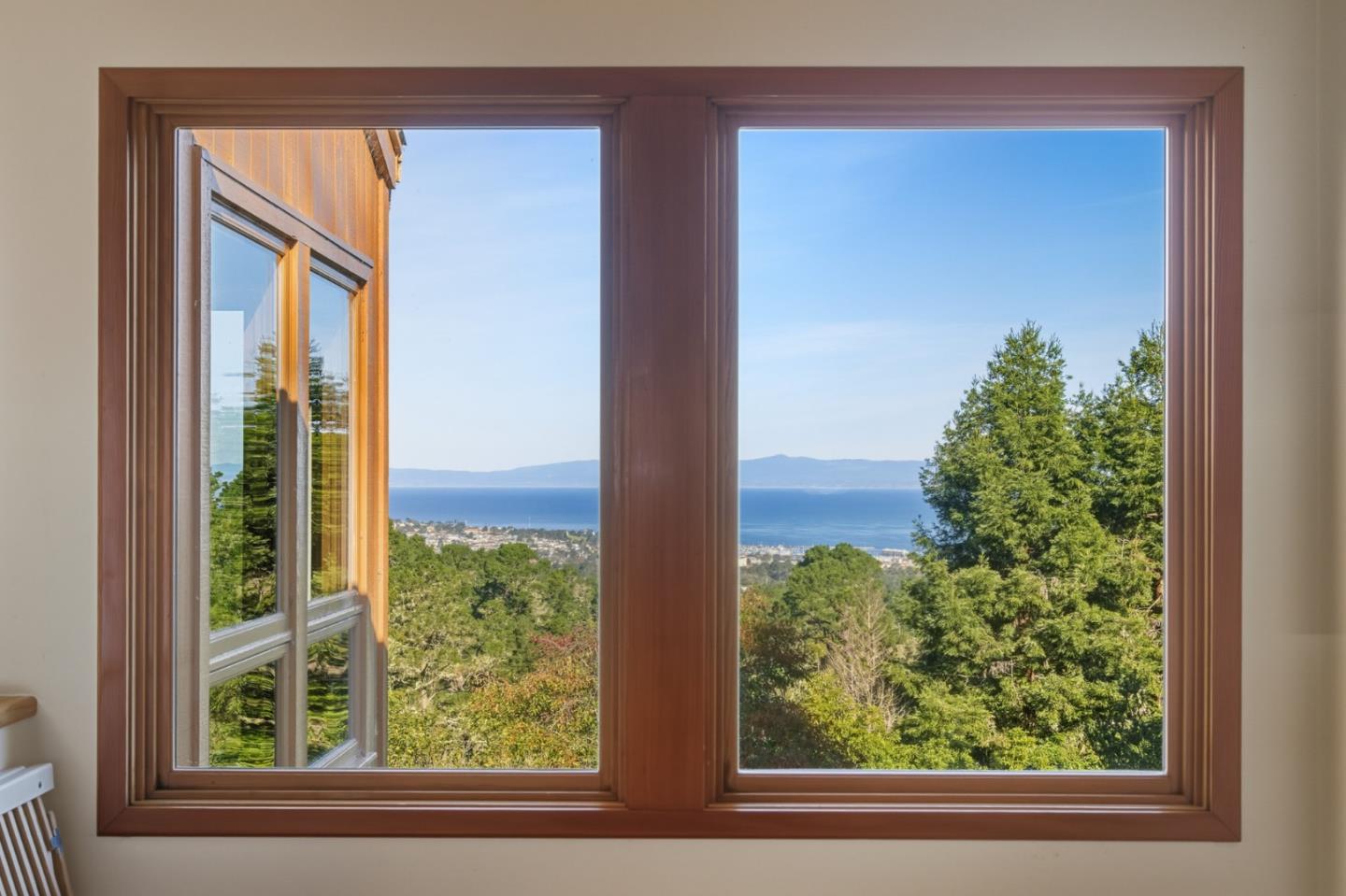 540 Aguajito Road Carmel, CA 93923 - Photo 21 of 32 a view of a window and a yard