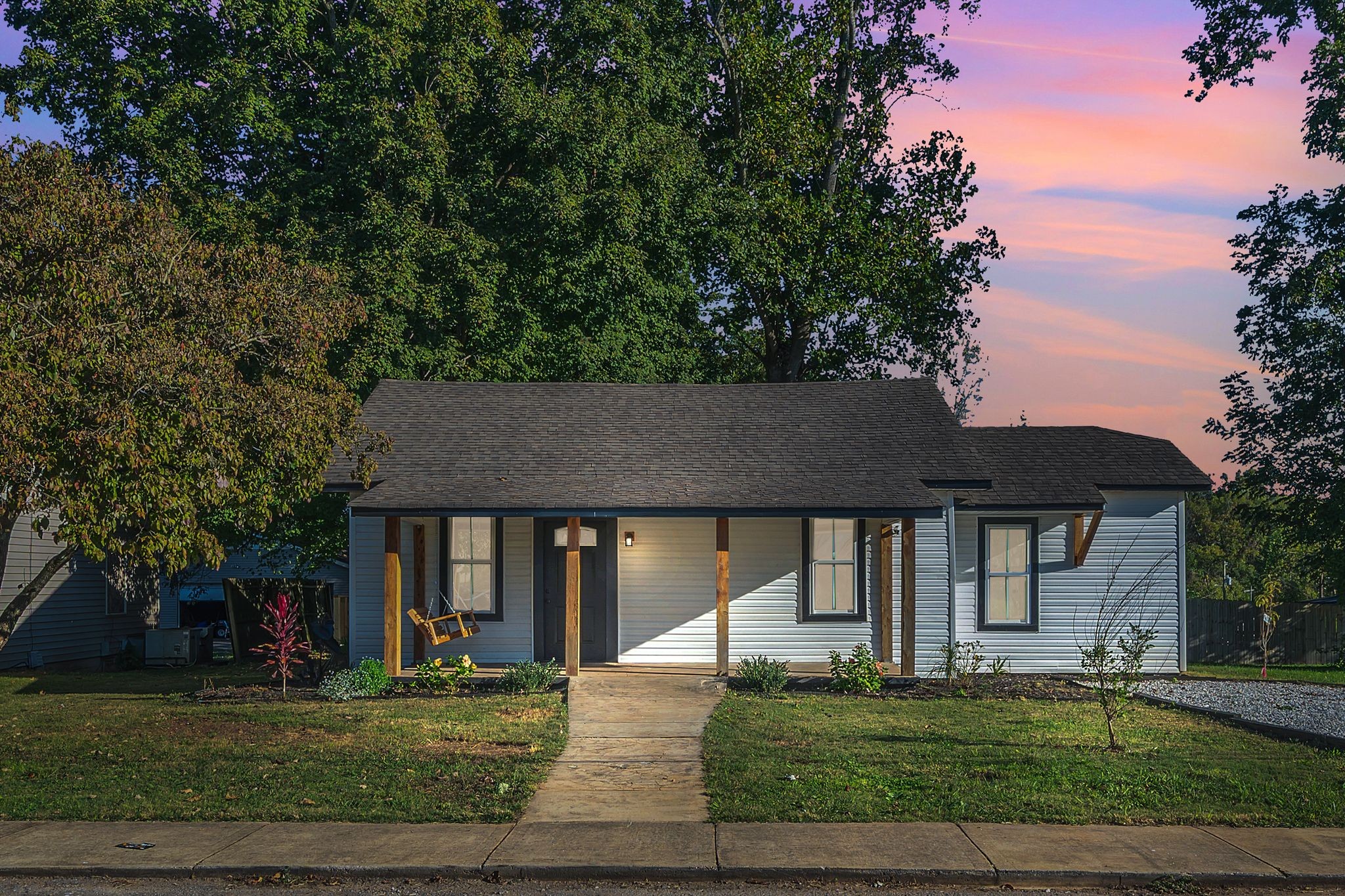 402 England Street East Cowan, TN 37318 - Photo 1 of 23 a front view of a house with a yard