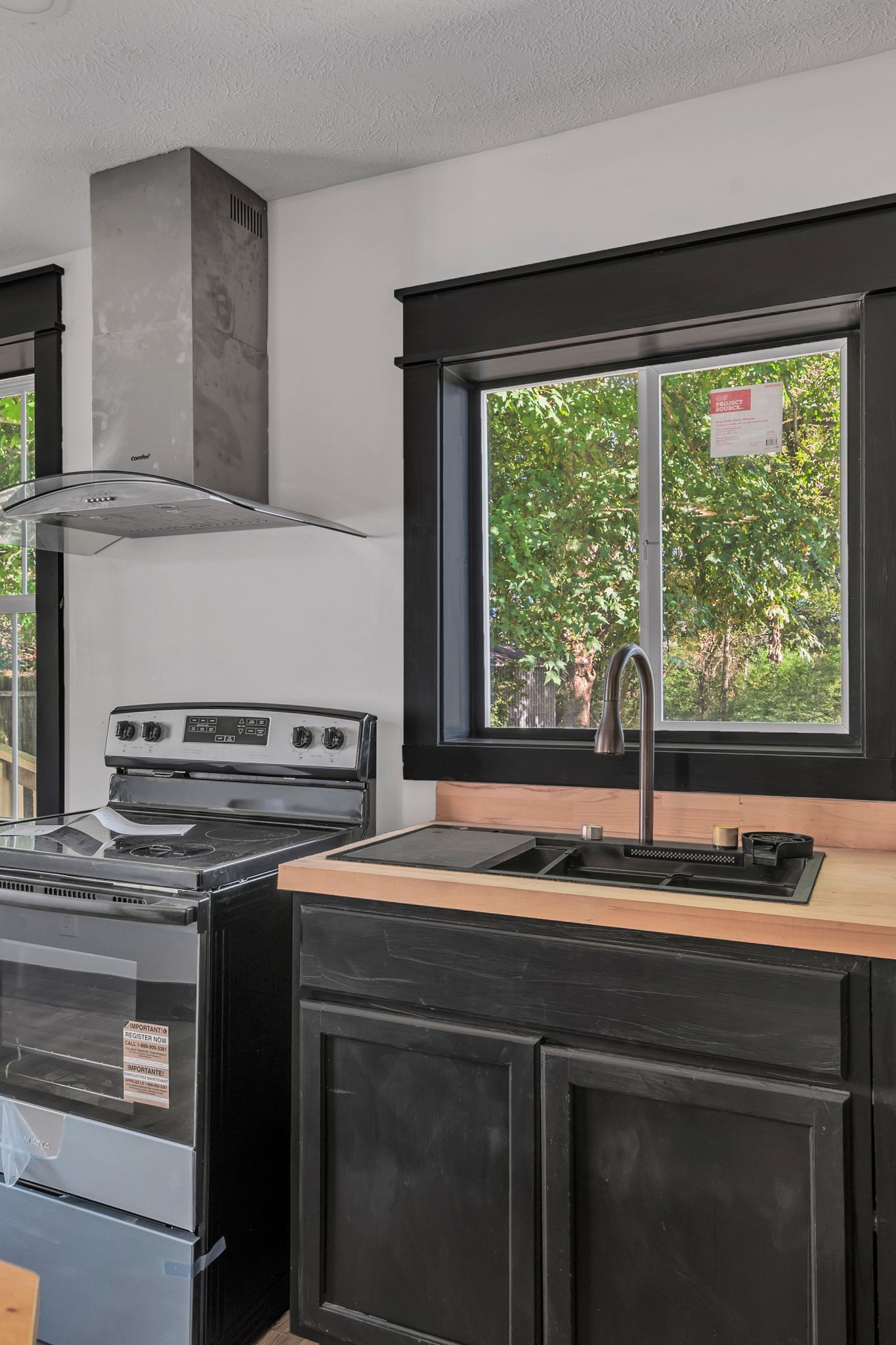 402 England Street East Cowan, TN 37318 - Photo 11 of 23 a kitchen with a stove and a sink
