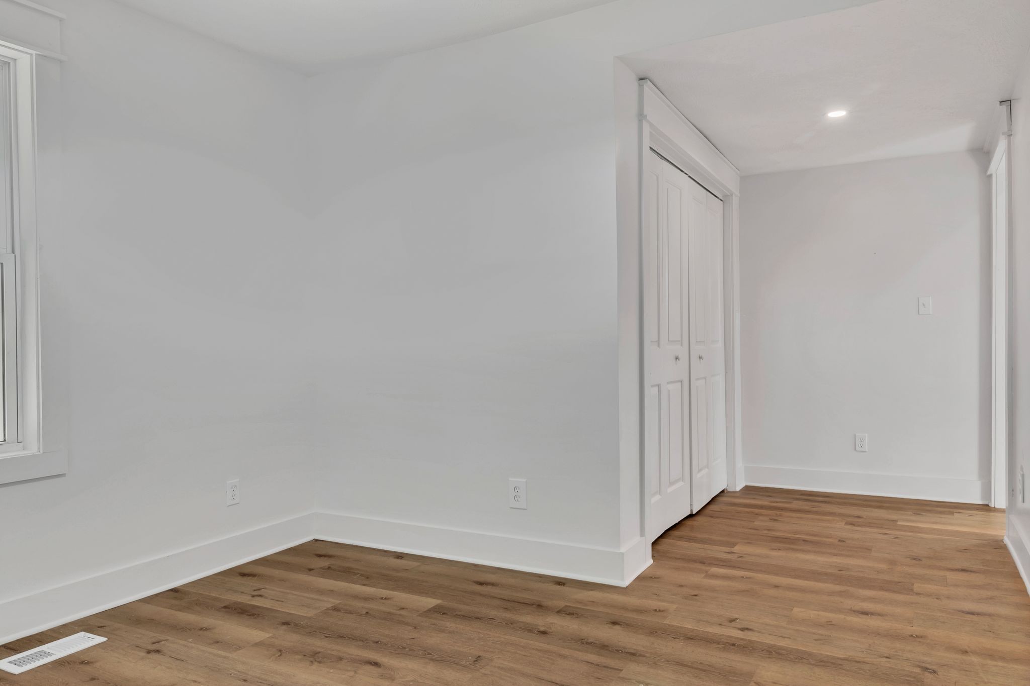 402 England Street East Cowan, TN 37318 - Photo 13 of 23 a view of an empty room with wooden floor