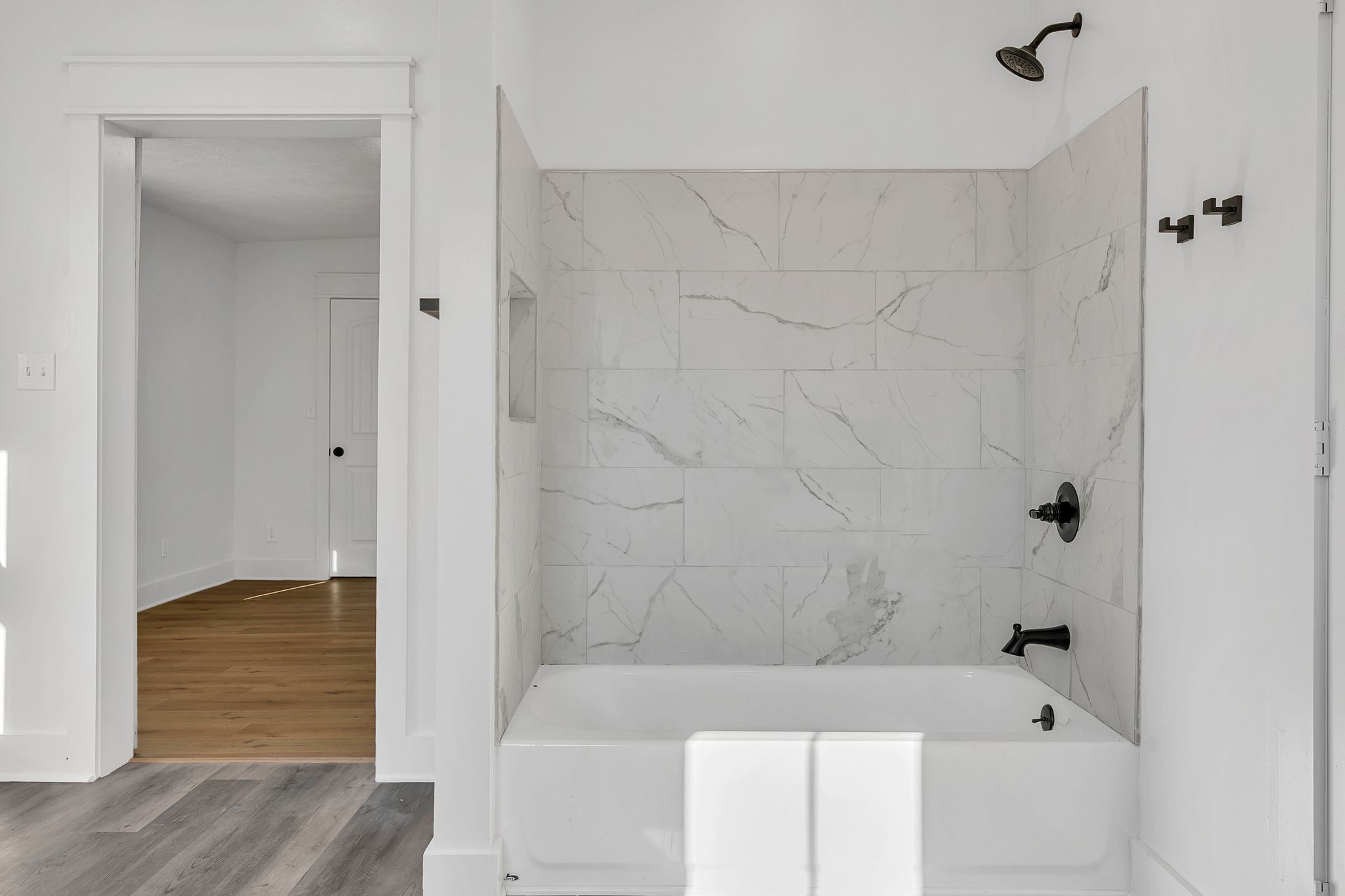 402 England Street East Cowan, TN 37318 - Photo 19 of 23 a bathroom with a bathtub and shower