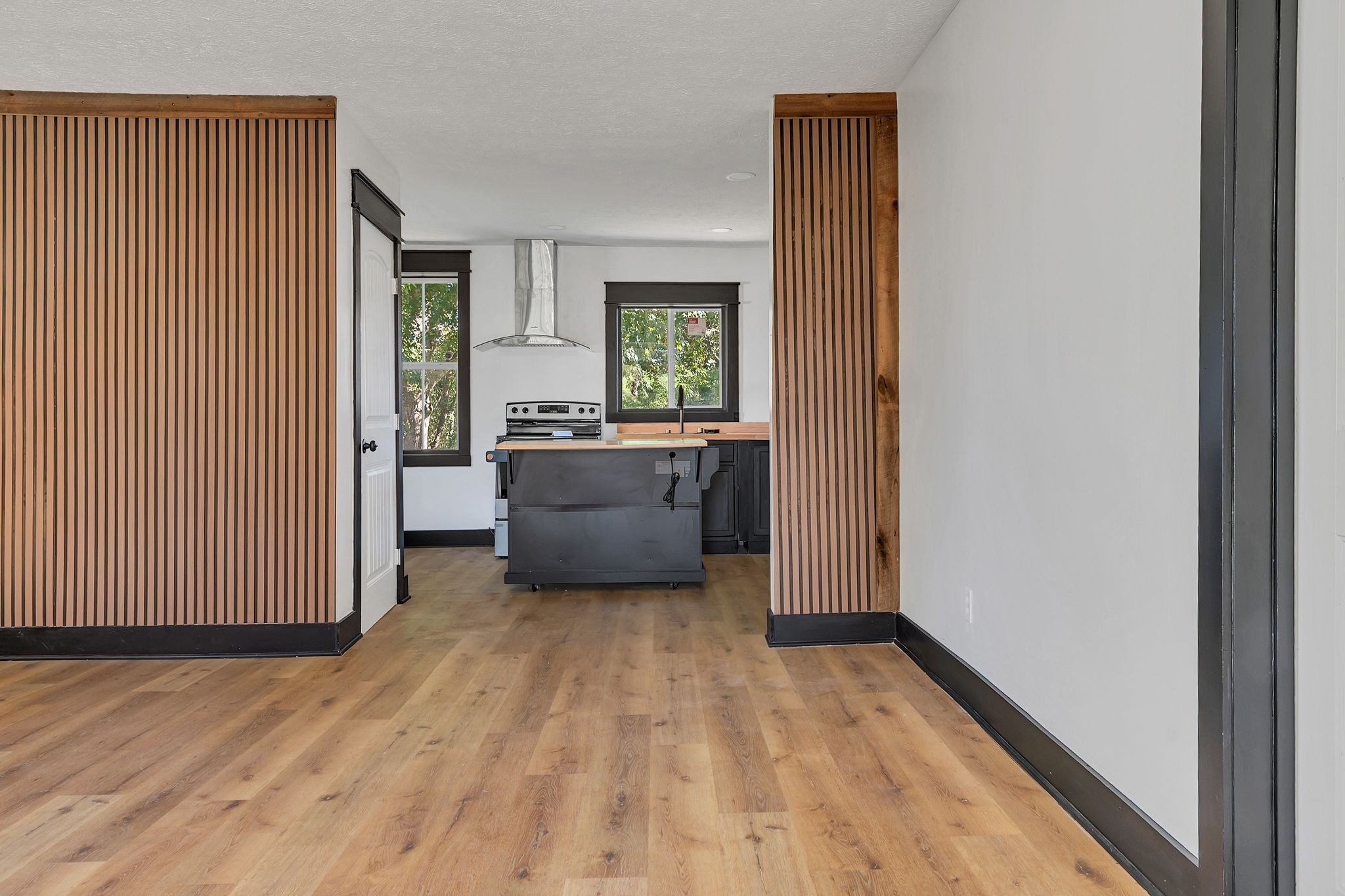 402 England Street East Cowan, TN 37318 - Photo 4 of 23 a view of room with window and wooden floor
