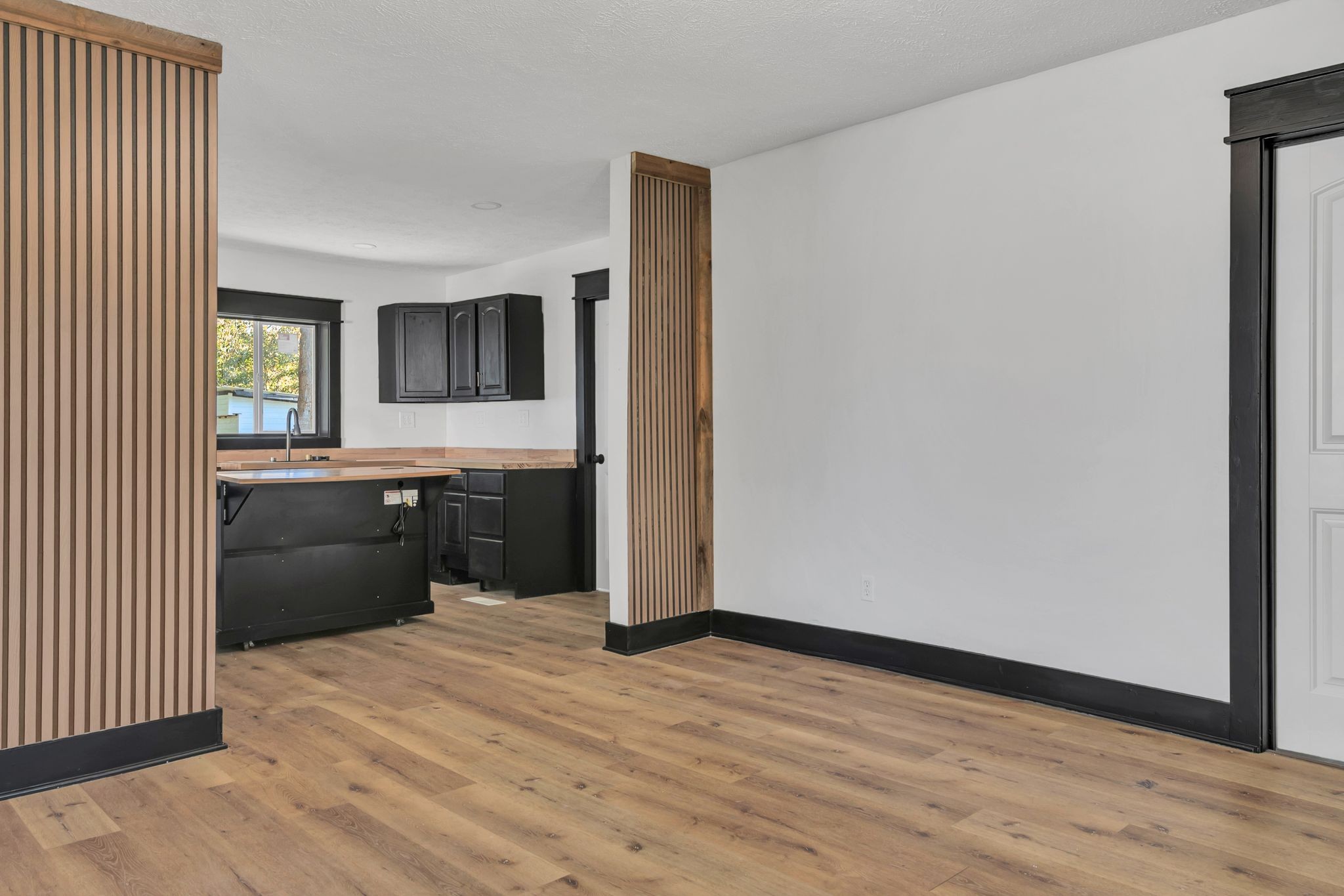 402 England Street East Cowan, TN 37318 - Photo 6 of 23 a view of a kitchen with wooden floor and electronic appliances