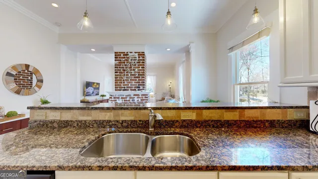a balcony of a house with wooden floor outdoor seating and wooden floors