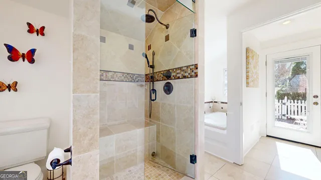 a bathroom with a granite countertop sink a mirror and a