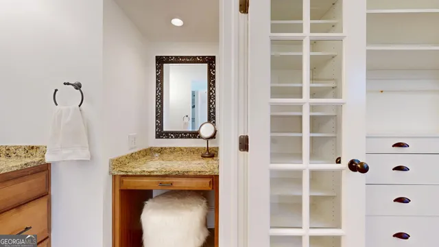 a white bath tub sitting in a bathroom