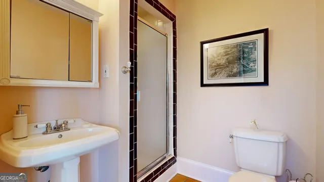 a bedroom with furniture and a potted plant