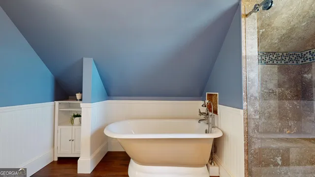 a view of a kitchen cabinets and a stove