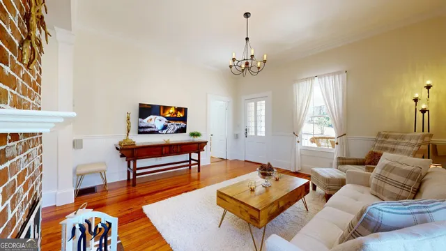 a living room with furniture and decor