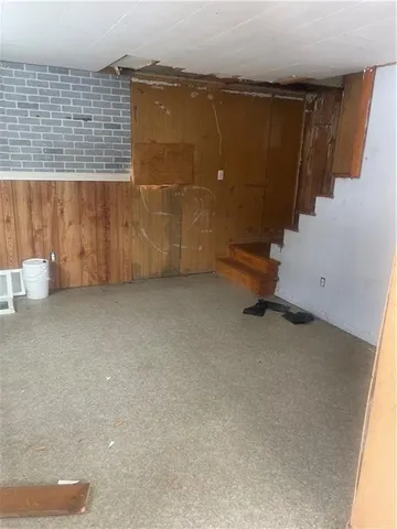 a view of kitchen and front door