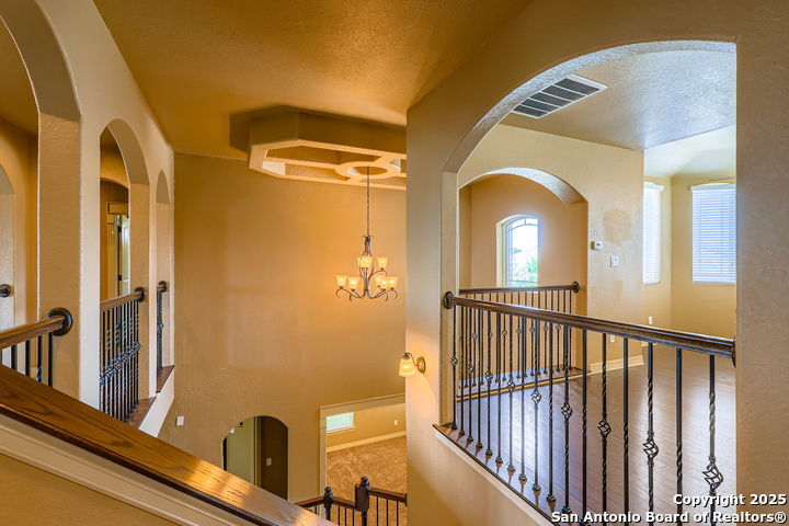 14722 Rifleman Road San Antonio, TX 78254 - Photo 24 of 37 a view of a livingroom with furniture and staircase