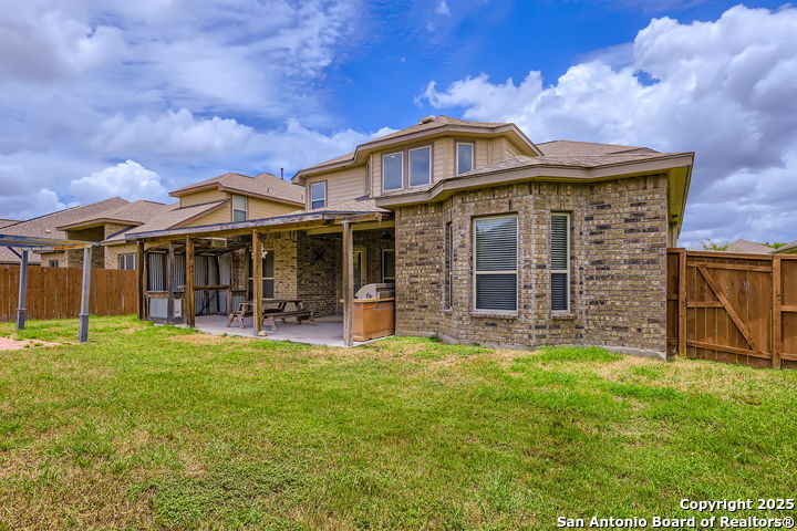 14722 Rifleman Road San Antonio, TX 78254 - Photo 32 of 37 front view of a house with a yard