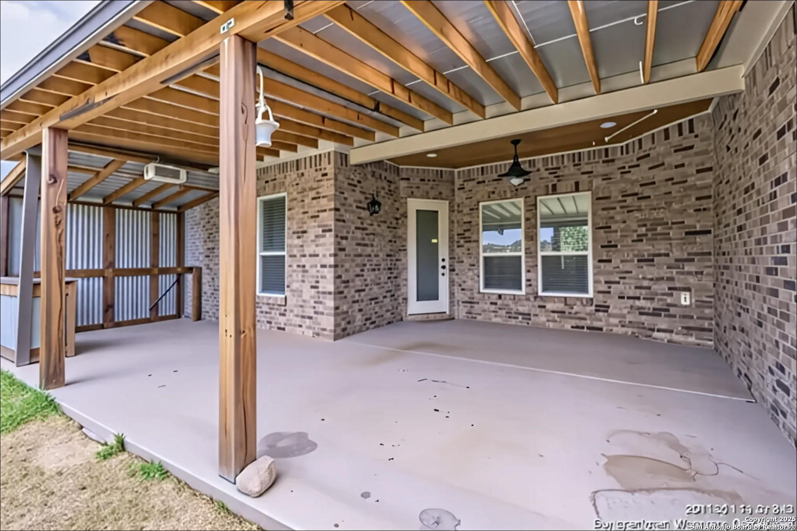 14722 Rifleman Road San Antonio, TX 78254 - Photo 34 of 37 a view of a porch with wooden floor and fence