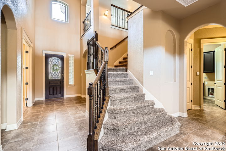 14722 Rifleman Road San Antonio, TX 78254 - Photo 5 of 37 a view of a hallway with wooden floor and entryway