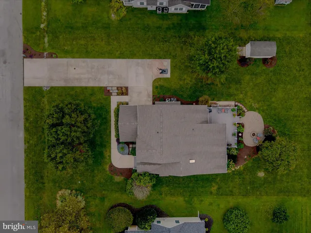 an aerial view of a golf course with outdoor space