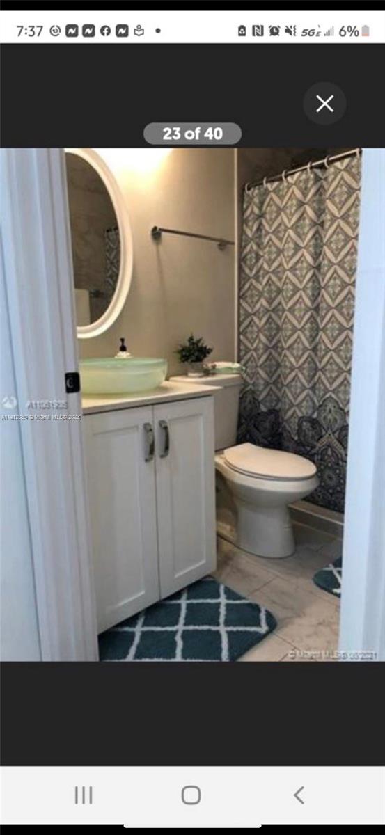 The Hammocks Miami, FL 33196 - Photo 10 of 18 a bathroom with a sink and a mirror