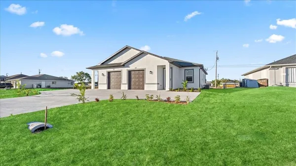 a front view of house with yard