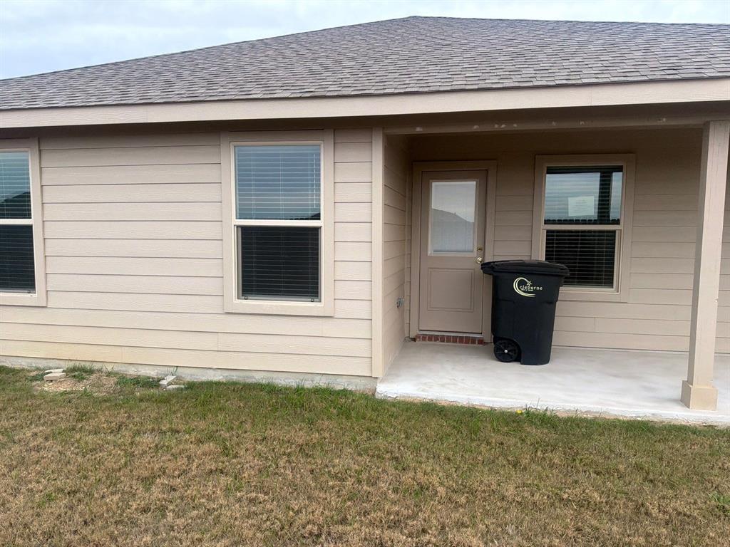 721 Durango Lane Cleburne, TX 76033 - Photo 23 of 25 a view of outdoor space yard and deck